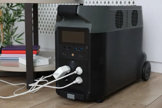 Chargers plugged into a portable power station at home